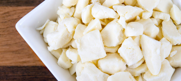 a photo of white dairy cheese curd in a bowl on table