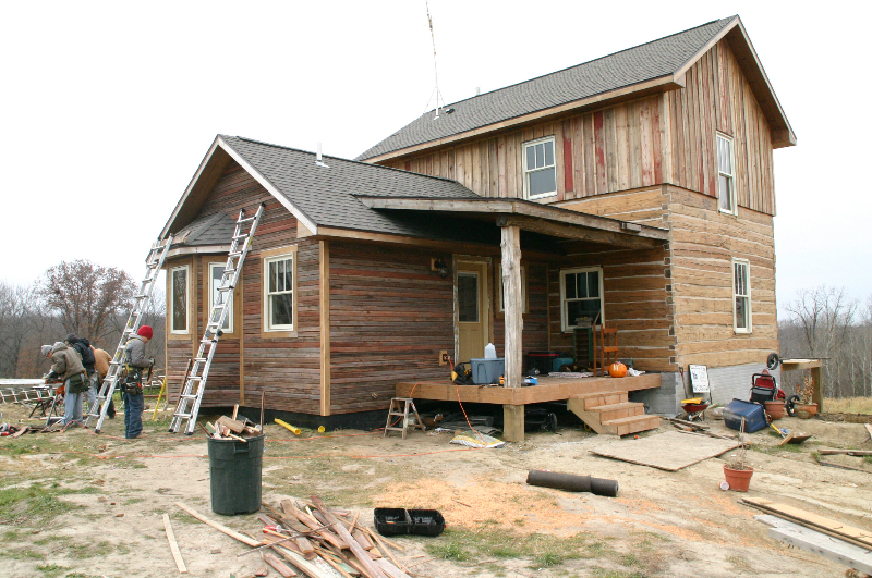 Restored 1860 log cabin house at East Henderson Farm