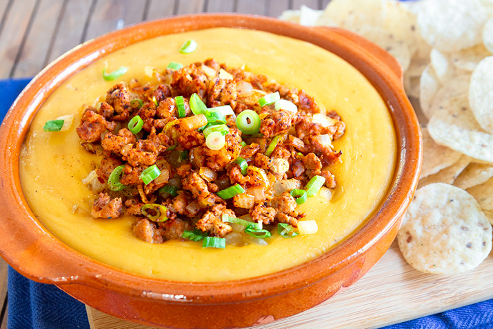 Start your parties (or meals) off right with this mouthwatering creamy queso dip.