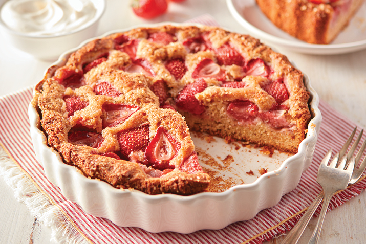 Strawberries are the star of this simple dessert, showcased in a meltingly tender, easy cake. 