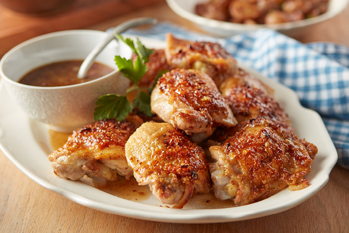 Honey and mustard combine to make a tangy, sticky glaze for these chicken thighs.